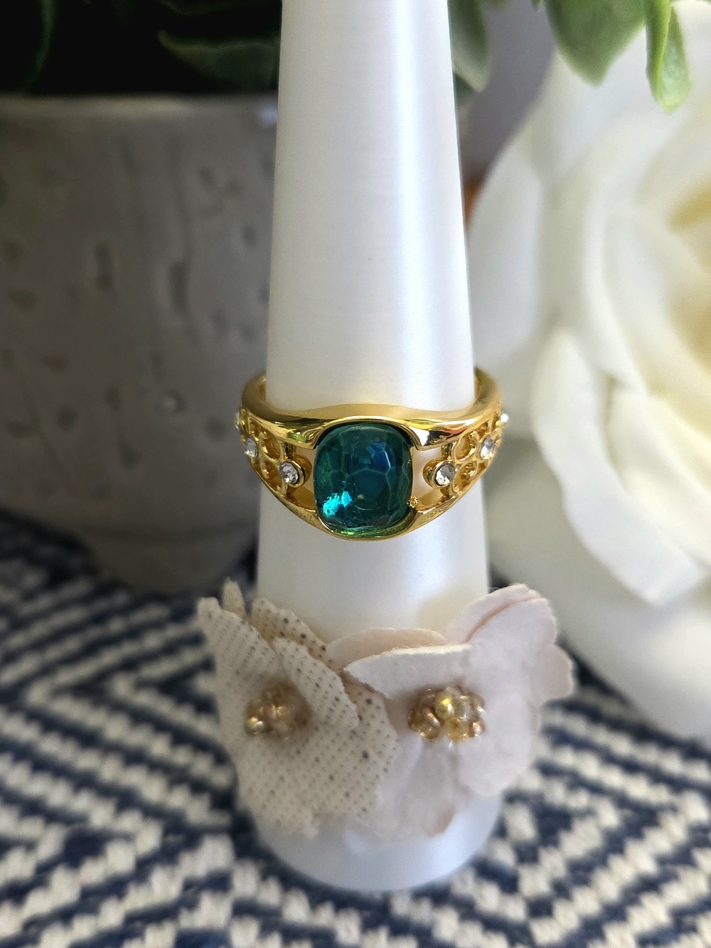 Gold-Plated Ring with Vivid Teal Gemstone and Accent Crystals